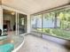 The covered patio overlooks the backyard providing a great space to relax and unwind at 1102 Cara Dr, Largo, FL 33771