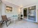 Enclosed patio with table and chairs providing a nice outdoor dining space at 1102 Cara Dr, Largo, FL 33771