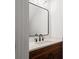 Bathroom featuring quartz countertops, black hardware, and undermount sink at 115 W Hiawatha St, Tampa, FL 33604