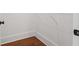 Small reach-in closet with hardwood floors and white wire shelving at 115 W Hiawatha St, Tampa, FL 33604