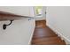 Wooden stairway leading to the next level, showcasing craftsmanship and design at 115 W Hiawatha St, Tampa, FL 33604
