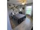 Stylized bedroom with decor, light-toned flooring, and a large window at 1185 Rio De Janeiro Ave, Punta Gorda, FL 33983