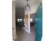 Welcoming foyer showcasing an open floor plan, stylish light fixture and decorative wall art at 1185 Rio De Janeiro Ave, Punta Gorda, FL 33983