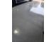 Garage floor is coated with epoxy and features a smooth, durable, and easy-to-clean surface at 1185 Rio De Janeiro Ave, Punta Gorda, FL 33983