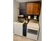Laundry room featuring modern washer and dryer and cabinetry at 1185 Rio De Janeiro Ave, Punta Gorda, FL 33983