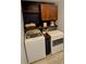 Laundry room featuring modern washer and dryer and cabinetry at 1185 Rio De Janeiro Ave, Punta Gorda, FL 33983