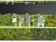 Aerial view of waterfront home with pool, dock, and canal access, outlined in red at 13045 Irwin Dr, Port Charlotte, FL 33953