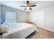 Bedroom features a plush bed and large closet at 13045 Irwin Dr, Port Charlotte, FL 33953