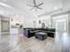 Open-concept living area connecting the kitchen, dining area, and living room at 13045 Irwin Dr, Port Charlotte, FL 33953