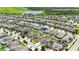 Beautiful community view with pond, green spaces, and many single-Gathering homes at 14524 Dunrobin Dr, Wimauma, FL 33598