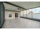 Covered and screened lanai featuring tile flooring, providing a relaxing outdoor space at 14524 Dunrobin Dr, Wimauma, FL 33598