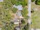 Aerial view of property highlighting backyard shed and surrounding greenery at 1520 S Michigan Ave, Clearwater, FL 33756