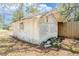 Shed showing a weathered exterior, offering potential storage in backyard at 1520 S Michigan Ave, Clearwater, FL 33756