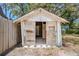 Open shed in backyard, revealing storage space at 1520 S Michigan Ave, Clearwater, FL 33756