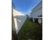 View of the backyard and the side of the house at 1521 Atami Ct, Wesley Chapel, FL 33544