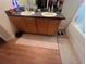 Bathroom featuring a double sink vanity with wood cabinets and a large mirror above at 1521 Atami Ct, Wesley Chapel, FL 33544