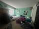 Bedroom with a window, shelves, and two beds at 1521 Atami Ct, Wesley Chapel, FL 33544