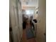 A laundry room with a door, a window, washer, and dryer at 1521 Atami Ct, Wesley Chapel, FL 33544