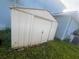 Metal shed located on the side of the house, providing storage space at 1521 Atami Ct, Wesley Chapel, FL 33544