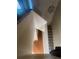 View of the stairway leading to the second floor at 1521 Atami Ct, Wesley Chapel, FL 33544