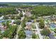 Neighborhood aerial view showing properties, mature trees, and community layout at 15722 Gardenside Ln, Tampa, FL 33624