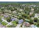 Neighborhood aerial view showing properties, mature trees, and community layout at 15722 Gardenside Ln, Tampa, FL 33624
