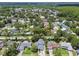 Neighborhood aerial view showing properties, mature trees, and community layout at 15722 Gardenside Ln, Tampa, FL 33624