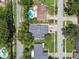 Neighborhood aerial view showing properties, mature trees, and community layout at 15722 Gardenside Ln, Tampa, FL 33624