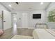 Comfortable bedroom featuring closet, neutral walls, and recessed lighting at 15722 Gardenside Ln, Tampa, FL 33624