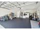 Spacious garage featuring ample storage, modern appliances and lots of room for vehicles and projects at 15722 Gardenside Ln, Tampa, FL 33624