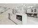 Bright open kitchen features a center island with built in microwave and seating at 15722 Gardenside Ln, Tampa, FL 33624