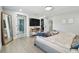 Spacious main bedroom with ensuite bathroom, walk-in closet, and contemporary design at 15722 Gardenside Ln, Tampa, FL 33624