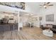 Spacious living area featuring an open floor plan with modern decor and bright lighting at 1830 Cypress Trace Dr, Safety Harbor, FL 34695