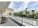 This large balcony offers great views, seating, and ample space to enjoy the outdoors at 19111 Whispering Pines Dr, Indian Shores, FL 33785