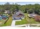 An aerial view of a charming house with fenced in yard and a newly installed horizontal wood fence at 1914 E Chelsea St, Tampa, FL 33610