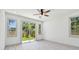 Bedroom featuring sliding glass doors at 1914 E Chelsea St, Tampa, FL 33610