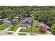 Charming single-story home features a modern exterior, well-manicured lawn, and a paved walkway leading to the front door at 1914 E Chelsea St, Tampa, FL 33610