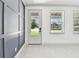 Entryway featuring decorative accent wall and ceramic tile flooring at 1914 E Chelsea St, Tampa, FL 33610