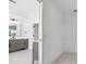 Bathroom view looking into closet at 21108 Bircholm Ct, Land O Lakes, FL 34637
