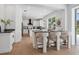 Bright, modern kitchen with stainless appliances, countertops and bar seating at 21108 Bircholm Ct, Land O Lakes, FL 34637