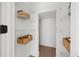 Walk-in pantry featuring wire shelving and wicker baskets, offering ample storage and organization at 21108 Bircholm Ct, Land O Lakes, FL 34637