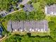 Bird's eye view of multiple residences showing roof detail and landscaping at 2175 Fox Chase Blvd, Palm Harbor, FL 34683