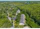 Aerial shot of residences with plenty of parking and green space at 2175 Fox Chase Blvd, Palm Harbor, FL 34683