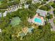Aerial shot of Community amenities, including pool, clubhouse, tennis courts, and recreational sports area at 2175 Fox Chase Blvd, Palm Harbor, FL 34683