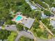 A high angle shot of neighborhood pool and common areas, playground and parking at 2175 Fox Chase Blvd, Palm Harbor, FL 34683
