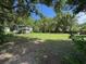 Large lot featuring the home among mature trees at 222 Spring Lake Hwy, Brooksville, FL 34602