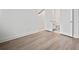 Spacious bedroom showcasing vinyl floors and a half bathroom with a toilet and vanity at 2511 N Grady Ave # 43, Tampa, FL 33607