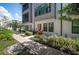 Street view of modern townhouses with meticulous landscaping and sidewalks at 2511 N Grady Ave # 43, Tampa, FL 33607