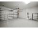 Spacious two-car garage with epoxy flooring, an electric vehicle charger, and ample room for storage at 2511 N Grady Ave # 43, Tampa, FL 33607
