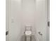 Modern half bathroom with sleek fixtures and neutral tile flooring at 2511 N Grady Ave # 43, Tampa, FL 33607